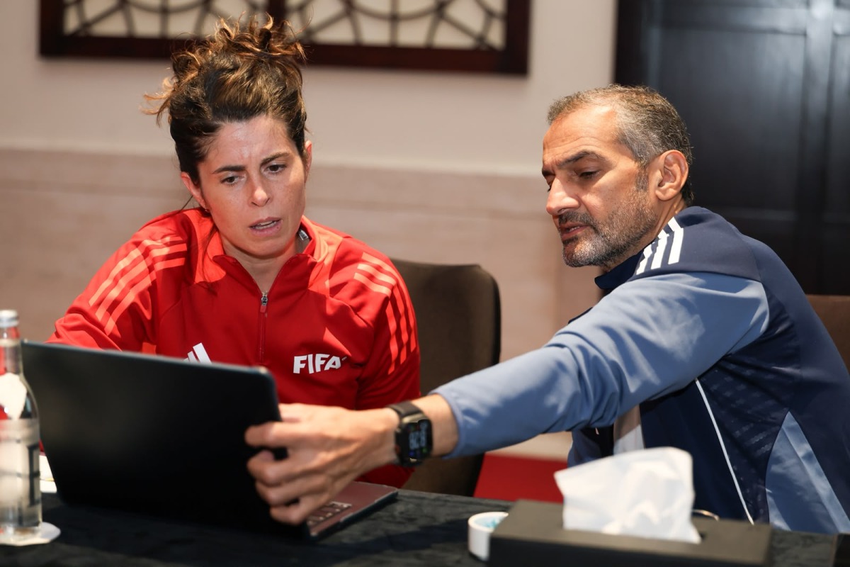 Dr. Jessica Miranda with AFC and QFA Referees Committees chairman Hani Taleb Ballan.