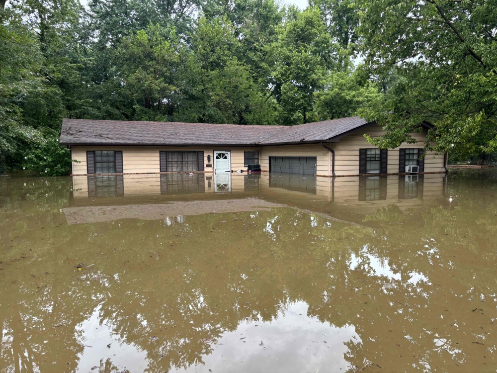 This handout photo distributed by the Indianapolis Fire Department shows flooding in northern Indianapolis, Indiana, on August 15, 2026. Photo by Handout / Indianapolis Fire Department / AFP) / 
