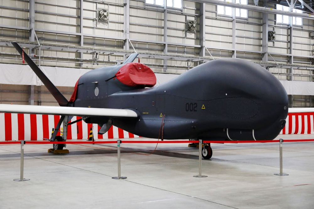 This picture taken on January 23, 2023 shows a Global Hawk unmanned surveillance aircraft of the Japan Air Self-Defence Force (JASDF) in Misawa, Aomori prefecture. (Photo by JIJI PRESS / AFP) / Japan OUT
