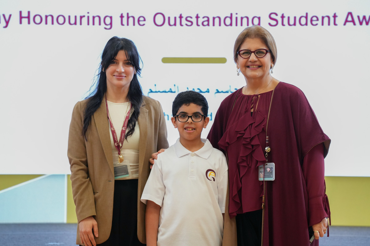 Director of Qatar Academy Msheireb Lina Mouchantaf (right) and another official with Jassim Mohammed Al Mosallam.