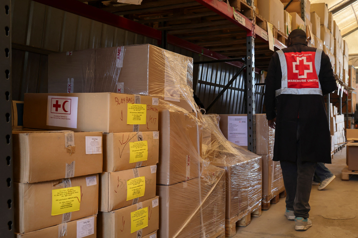 Kenya Red Cross warehouse personnel inspect batches of medical kits before before deployment as efforts to contain rising cases of Ebola ramp up in the Kenyan capital Nairobi on October 19, 2026. (Photo by Tony KARUMBA / AFP)