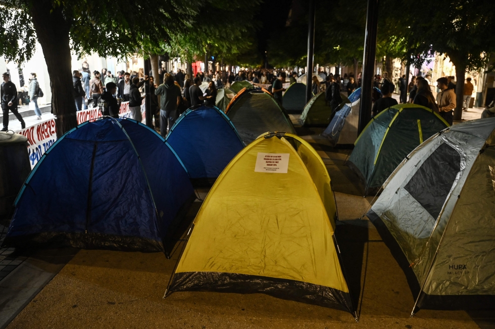 Students set up a symbolic encampment in the Agias Sofias square in Thessaloniki on October 20, 2026. (Photo by Sakis Mitrolidis / AFP)