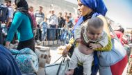 Syrians are seen with their belongings in the Karkamis district of Gaziantep, Turkey on September 09, 2016.  Kerem Kocalar - AA
