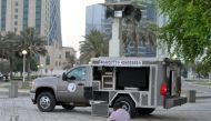 A man prays near a ‘mobile mosque’ at the Sheraton Park in Doha yesterday.  (Pic: Kammutty VP/The Peninsula)