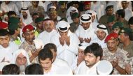 Emir H H Sheikh Tamim bin Hamad Al Thani performing the funeral prayers for Lance Corporal Mohammad Awadh Salem and the troopers Mohammad Dawood Khayyal and Mohammad Nasser Mohammad, who were martyred while carrying out their duty in Yemen, at the Mosque 