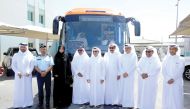 Minister of Transport and Communication H E Jassim bin Saif Al Sulaiti (fourth left), Minister of Education and Higher Education H E Dr. Mohammed Abdul Wahed Ali Al Hammadi (fifth left), Nasser bin Mohammed Al Malki (third right), Chairman, Board of Direc