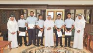Customs officials with employees who were honoured for seizing the narcotics.