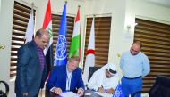 Officials signing the MoU.