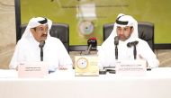 Katara General Manager Dr. Khalid bin Ibrahim Al Sulaiti (right) and Qatari Engineer Essa S R Al Kuwari at the launch of the calendar at Katara yesterday.