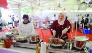 Qatari Chef Aisha Al Tamimi prepares a dish at the International Culinary Festival and Competition in Kochi, India.