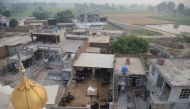 An aerial view of the India-Pakistan border village of Daoke, about 40 kms from Amritsar on September 30, 2016. AFP / NARINDER NANU