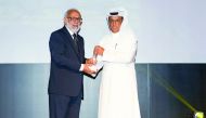 Salem Al Kubaisi, Chief Corporate Services Officer at Katara Hospitality, receiving the award on behalf of Katara Hospitality.