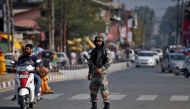 An Indian army soldier stands guard on a road on the outskirts of Srinagar, October 3, 2016. Reuters/Danish Ismail