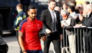 Arsenal's Theo Walcott arrives before the match. Reuters / Jason Cairnduff