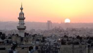 The sun sets over Aleppo as seen from rebel-held part of the city, Syria October 5, 2016. Reuters/Abdalrhman Ismail 