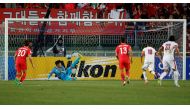 Suwon, South Korea - 06/10/16 - Hasan Al Haydos (2nd R) of Qatar scores a goal. REUTERS/Kim Hong-Ji
