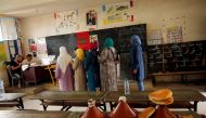 Voters queue to cast their ballots at a polling station on the outskirts of Rabat, Morocco October 7, 2016. REUTERS/Youssef Boudlal
