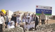Officials from RAF and Turkish humanitarian organisation IHH laying the foundation stone for the housing project at Bab Al Hawa camp along Syrian-Turkey border.