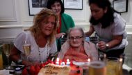 British journalist Clare Hollingworth, the first correspondent to report the outbreak of World War II, sits in front of a birthday cake during a party celebrating her 105th birthday in Hong Kong, China October 10, 2016. REUTERS/Bobby Yip
