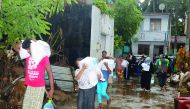 Flood victims collecting aid from RAF volunteers in Sri Lanka.