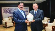 H E Dr Hamad bin Abdulaziz Al Kawari with China’s Minister of Culture Luo Shugang. 