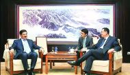 H E Dr Hamad bin Abdulaziz Al Kawari with China’s Minister of Culture Luo Shugang.
