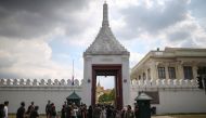 Mourners walk in line to pay their respects to Thailand's late King Bhumibol Adulyadej at the Grand Palace in Bangkok, Thailand, October 15, 2016. Reuters/Athit Perawongmetha