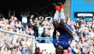 Chelsea's Nigerian midfielder Victor Moses (R) celebrates after scoring their third goal during the English Premier League football match between Chelsea and Leicester City at Stamford Bridge in London on October 15, 2016. Chelsea won the game 3-0.  AFP /