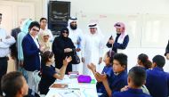 A delegation from Qatar comprising RAF officials, Qatari Ambassador and members of donor family with students at a classroom of the school in Tunisia.