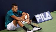  This file photo taken on July 25, 2016 in Toronto, shows Nick Kyrgios of Australia sitting at the end of the court as he waits for the final game in his match against Denis Shapovalov of Canada during Day 1 of the Rogers Cup at the Aviva Centre. (AFP / G