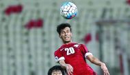 Action from match between Qatar and Japan in Riffa.