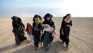 Civilians return to their village after it was liberated from Islamic State militants, south of Mosul, Iraq October 21, 2016. REUTERS/Thaier Al-Sudaini
