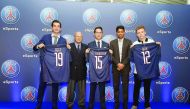 Paris Saint-Germain President Nasser Al Khelaifi (second right) and Marc Ladreit de Lacharrière, the CEO of Fimalac (second left) pose for a photograph with their newest signings, France’s Bora Kim, Lucas Cuillerier and Denmark’s August Rosenmeier during 