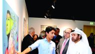 General Manager of the Cultural Village Foundation-Katara, Dr Khalid bin Ibrahim Al Sulaiti, inaugurating the exhibition of Palestinian artist Mohammed Qraiqea, titled the “Free Bird” 