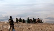 Kurdish peshmerga fighters take their position during an operation to attack Islamic State militants in the town of Naweran near Mosul, October 23, 2016. REUTERS/Azad Lashkari