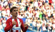 (FILES) This file photo taken on September 17, 2016 shows Atletico Madrid's French forward Antoine Griezmann celebrating after scoring during the Spanish league football match Club Atletico de Madrid vs Real Sporting de Gijon at the Vicente Calderon stadi