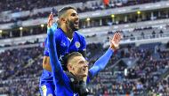 Leicester City’s Jamie Vardy (bottom) celebrates with Riyad Mahrez after scoring a goal against Newcastle United during their Premier League match at St James’ Park in Newcastle, Britain, in this November 21, 2015 file photo.