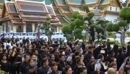Mourners walk in line to enter the Throne Hall at the Grand Palace for the first time to pay respects to the body of Thailand's late King Bhumibol Adulyadej that is kept in a golden urn in Bangkok, Thailand, October 29, 2016. Reuters/Athit Perawongmetha
