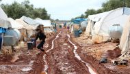 ALEPPO, SYRIA - NOVEMBER 1: A view of a muddy ground tent city which is submerged due to the rain near the Bab al-Salam border gate in Azez district of Aleppo, Syria on November 1, 2016.( Stringer - Anadolu Agency )