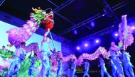 Artistes from China’s Zhejiang Province perform the traditional Lotus Dragon dance marking the opening of the Chinese Festival yesterday at Museum of Islamic Art Park. Pic: Baher Amin / The Peninsula