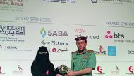 Kahramaa’s Human Resources Department Manager Najlaa Al Buanain receiving the Digital HR of the Year Award.
