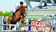 British Olympic Gold Medallist John Whitaker astride Argento, clears a hurdle during the CSI5* 1.50/1.55m event of Longines Global Champions Tour at Al Shaqab Arena yesterday. LGCT/Stefano Grasso 
