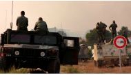 Tunisian soldiers gather near the border with Algeria around Mount Chaambi, western Tunisia, August 2, 2013. (File Photo: Reuters)
