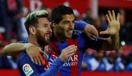 Barcelona's Luis Suarez celebrates with Lionel Messi after scoring. REUTERS/ Marcelo del Pozo
