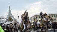 Elephants are paraded in front of the Grand Palace to pay respects to the late Thai King Bhumibol Adulyadej in Bangkok on October 8, 2016. Thailand's King Bhumibol Adulyadej died at the age of 88 on October 13 after years of ill health, ending a seven-dec
