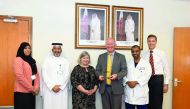Dr Yousuf Al Maslamani, Medical Director of Hamad General Hospital (second left ) and Professor Mike Richmond, HMC’s Chief Medical Officer (fourth left) with other officials after receiving the ‘Healthcare Implementation of the Year’ award.