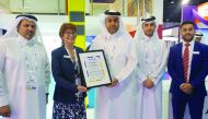 Abdulla Al Khanji, CEO of MWANI Qatar, receives the Best Space Stand award.