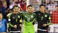 Mexico defender Rafael Marquez (4) and teammates Alfredo Talavera (12) and Hugo Ayala (2) celebrate following the second half against the USA at MAPFRE Stadium. Mexico won the game 2-1. /Joe Maiorana