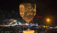 This picture taken on November 11, 2016 shows participants releasing a hot-air balloon during the Tazaungdaing Lighting Festival at Taunggyi in Myanmar's northeastern Shan State. AFP / YE AUNG THU