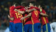 Spain's players celebrate after scoring during the FIFA qualifying Group G football match Spain vs Macedonia at Los Carmenes stadium in Granada, on November 12, 2016. Spain won 4-0. / AFP / JORGE GUERRERO